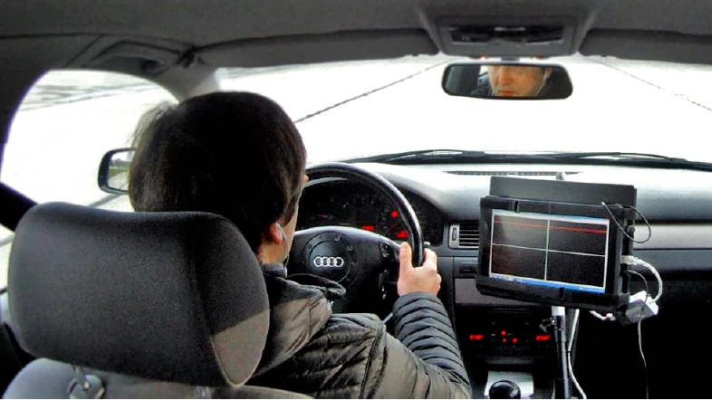 The car had a human driver for safety reasons