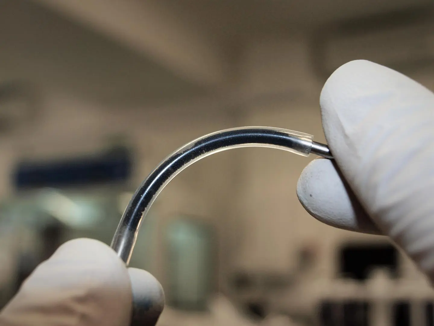 A flexible tube, filled with an emulsion of water, oil and graphene