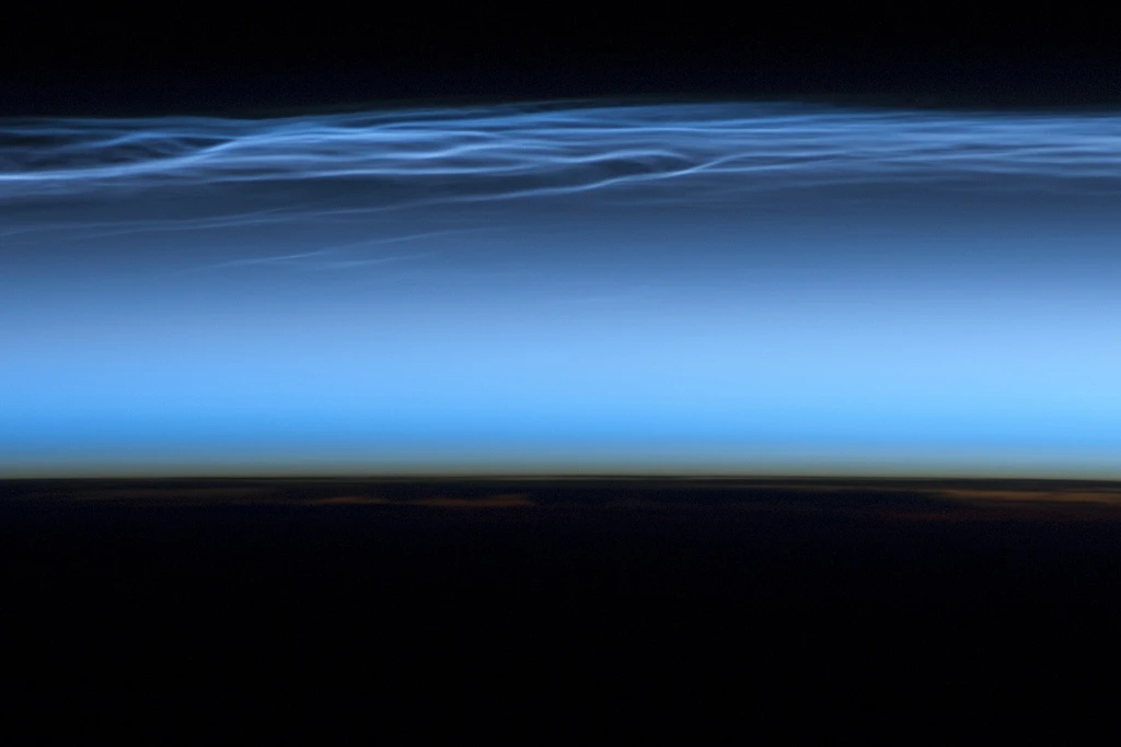 June 13, 2012: Polar Mesospheric Clouds in the Northern Hemisphere (Image: NASA ISS - Digital Camera)