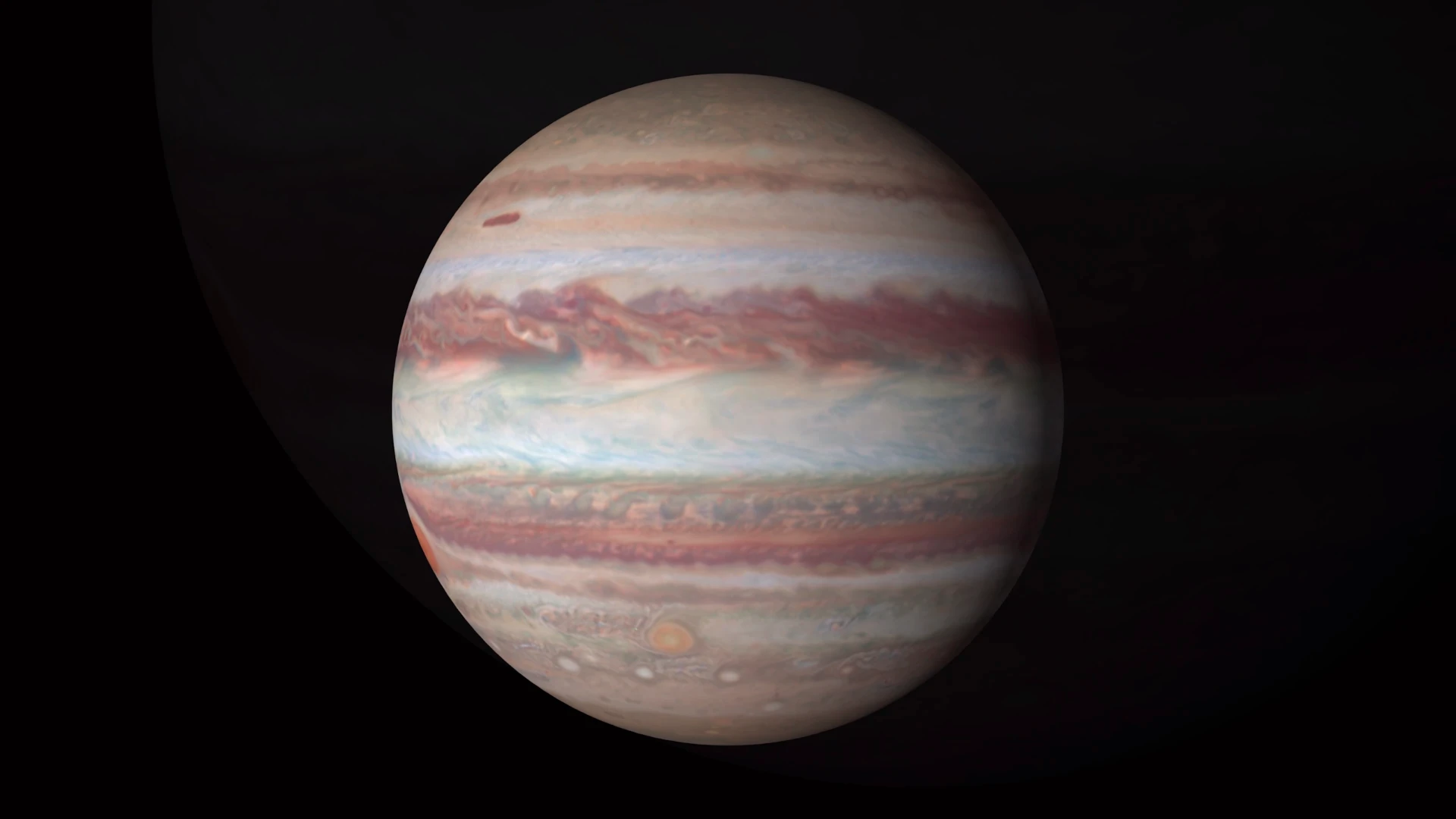 The photos are the first in a series of yearly 4K portraits of our solar system's outer planets and reveal a pair of intriguing features on Jupiter