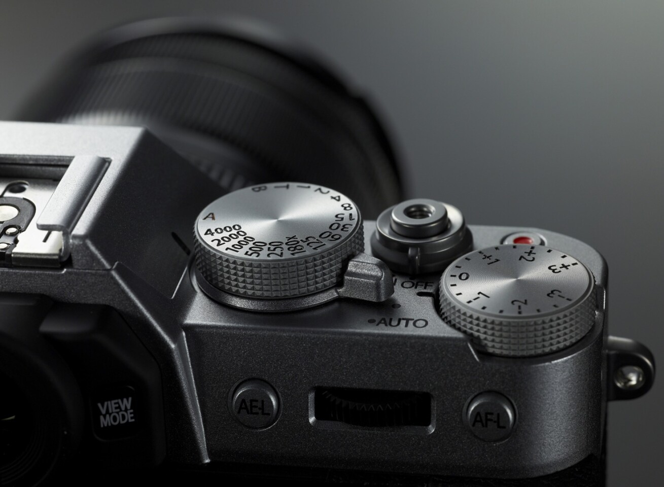 An Auto Mode Switch lever on the Fujifilm X-T10 can be used to access the fully-automatic Advanced SR Auto mode