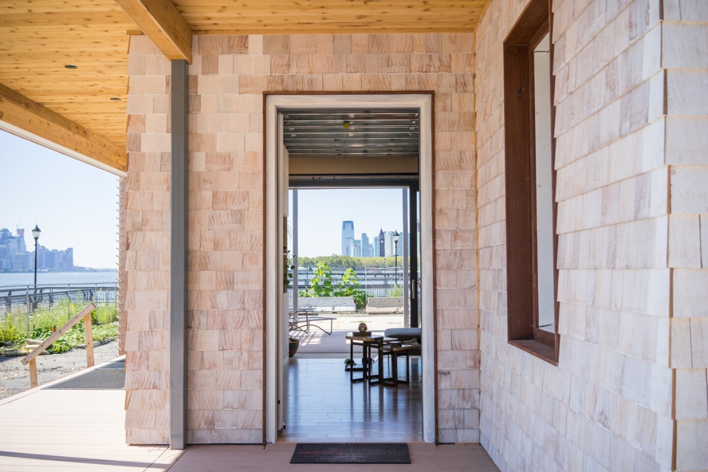The Sure House has a rainscreen system on its façade that provides protection from water damage by way of an additional outer skin of cladding with an air cavity