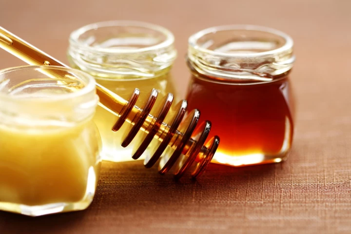 Official advice recommends self-care, including taking honey, for many coughs