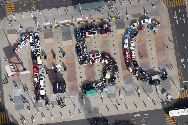 The participating vehicles of the 2016 WAVE Trophy form the 1.5ºC hashtag at the Place Des Nations in Geneva, Switzerland