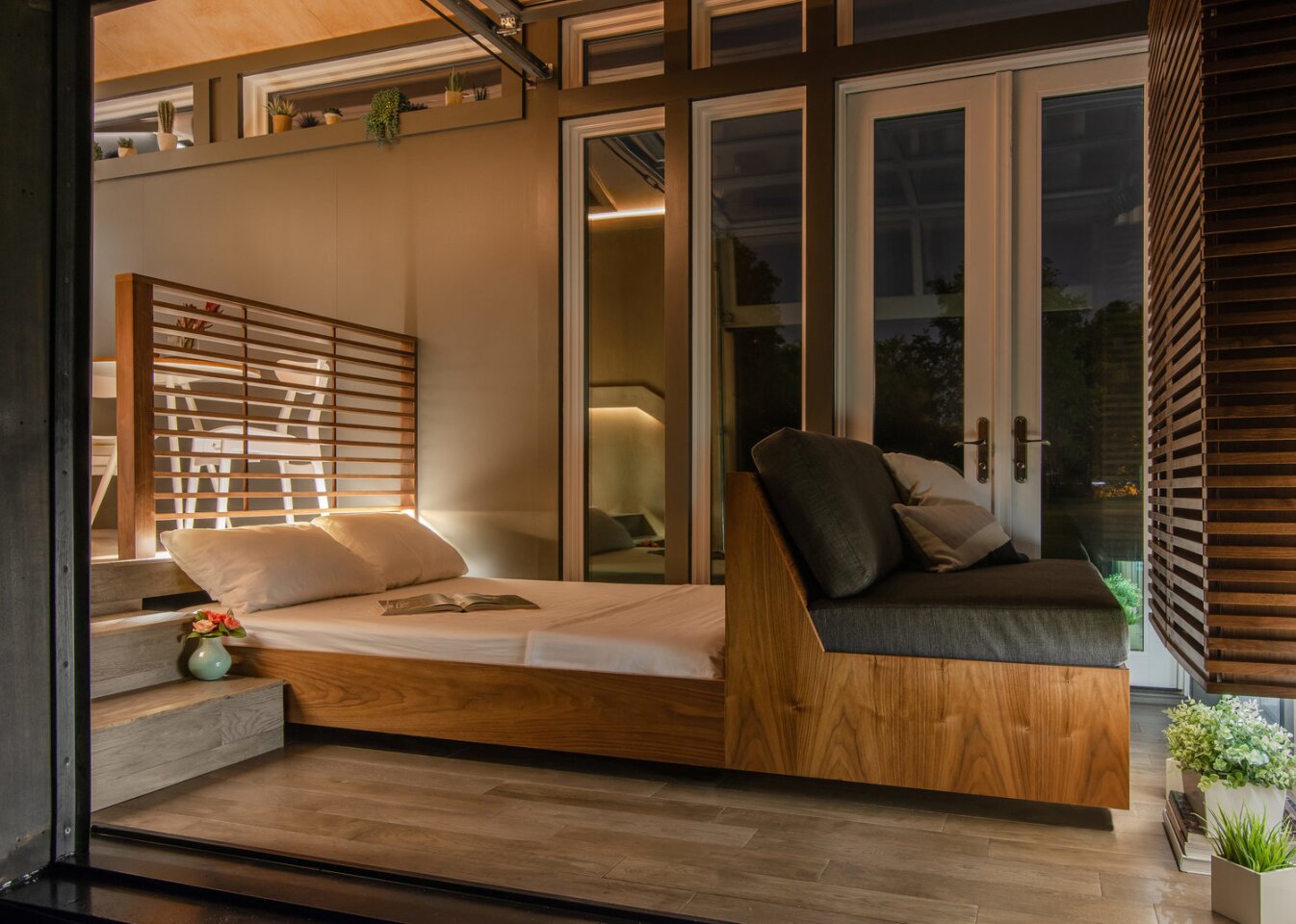 The Orchid Tiny House's sofa pulls out into a bed