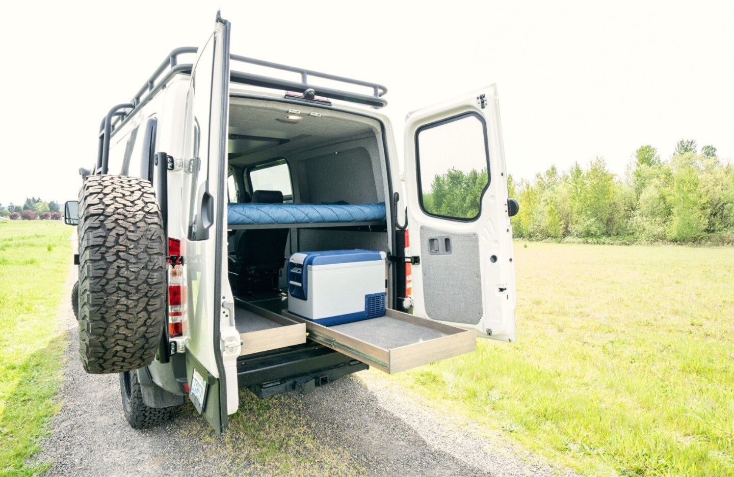 Swiss Army Sprinter camper van packs five people, solar power and