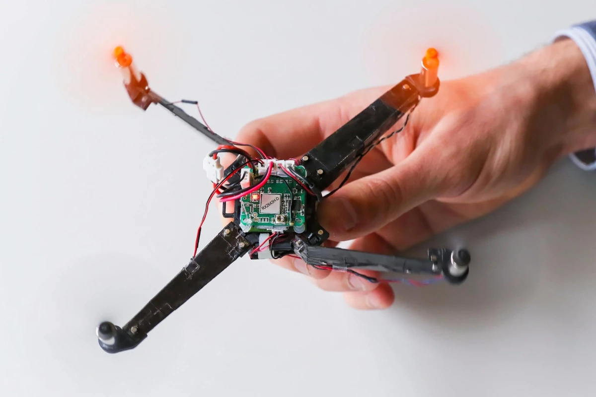 Once fired up, the power of the drone's rotors force the arms into position in one third of a second