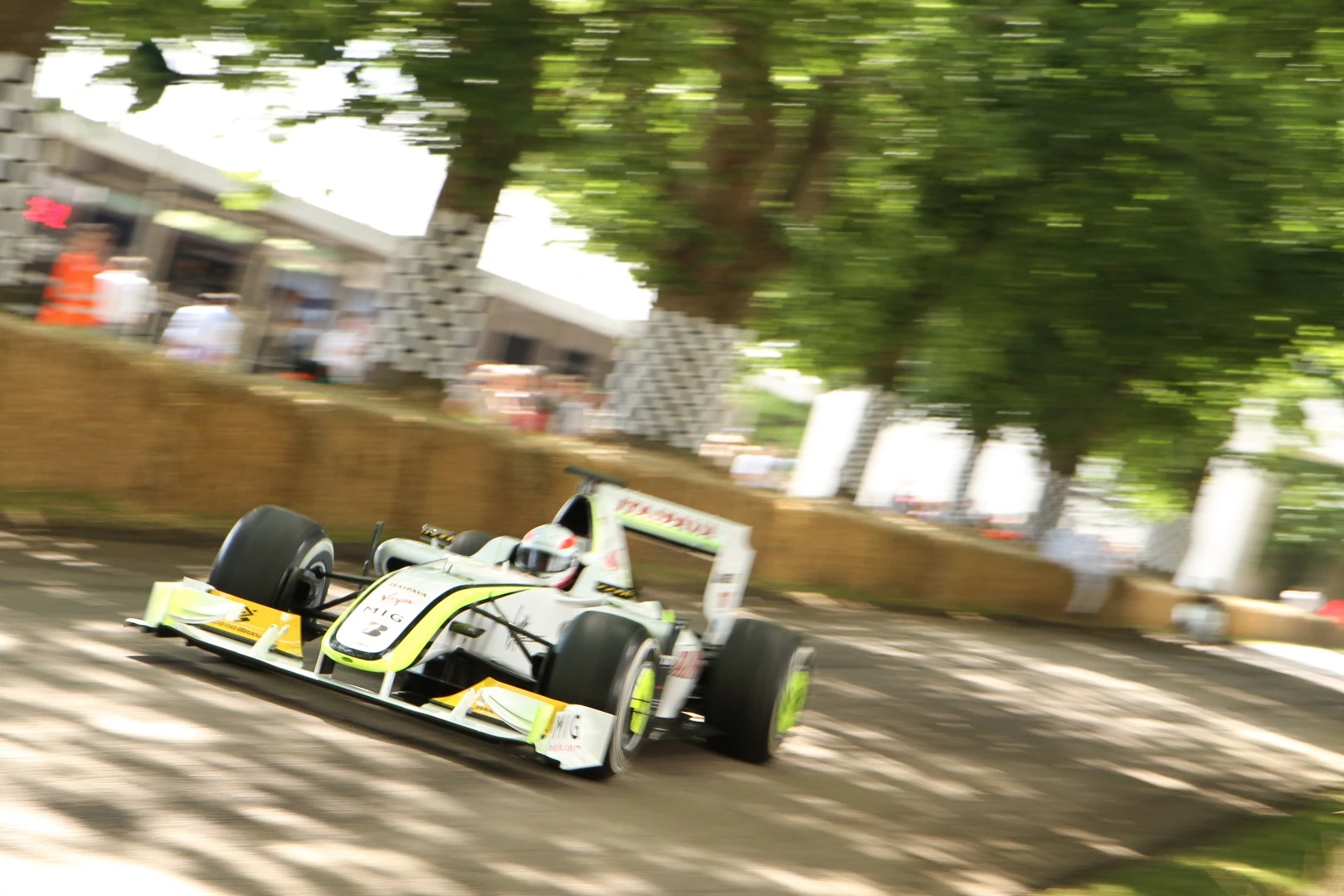 The Brawn BGP 001 running up the hill at the hands of Martin Brundle