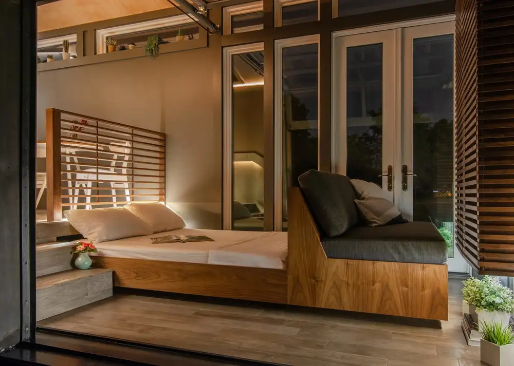 The Orchid Tiny House's sofa bed, shown in the pulled-out position