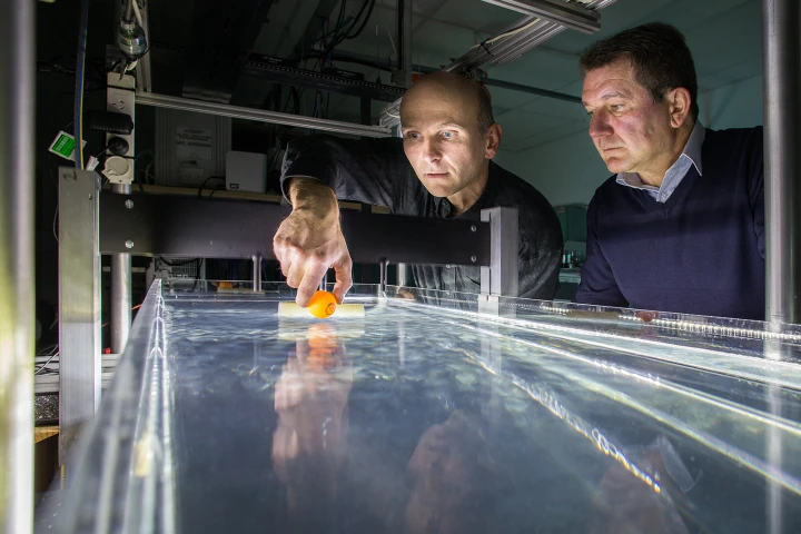 Dr. Horst Punzmann and team leader Prof. Michael Shats, at the ANU wave tank