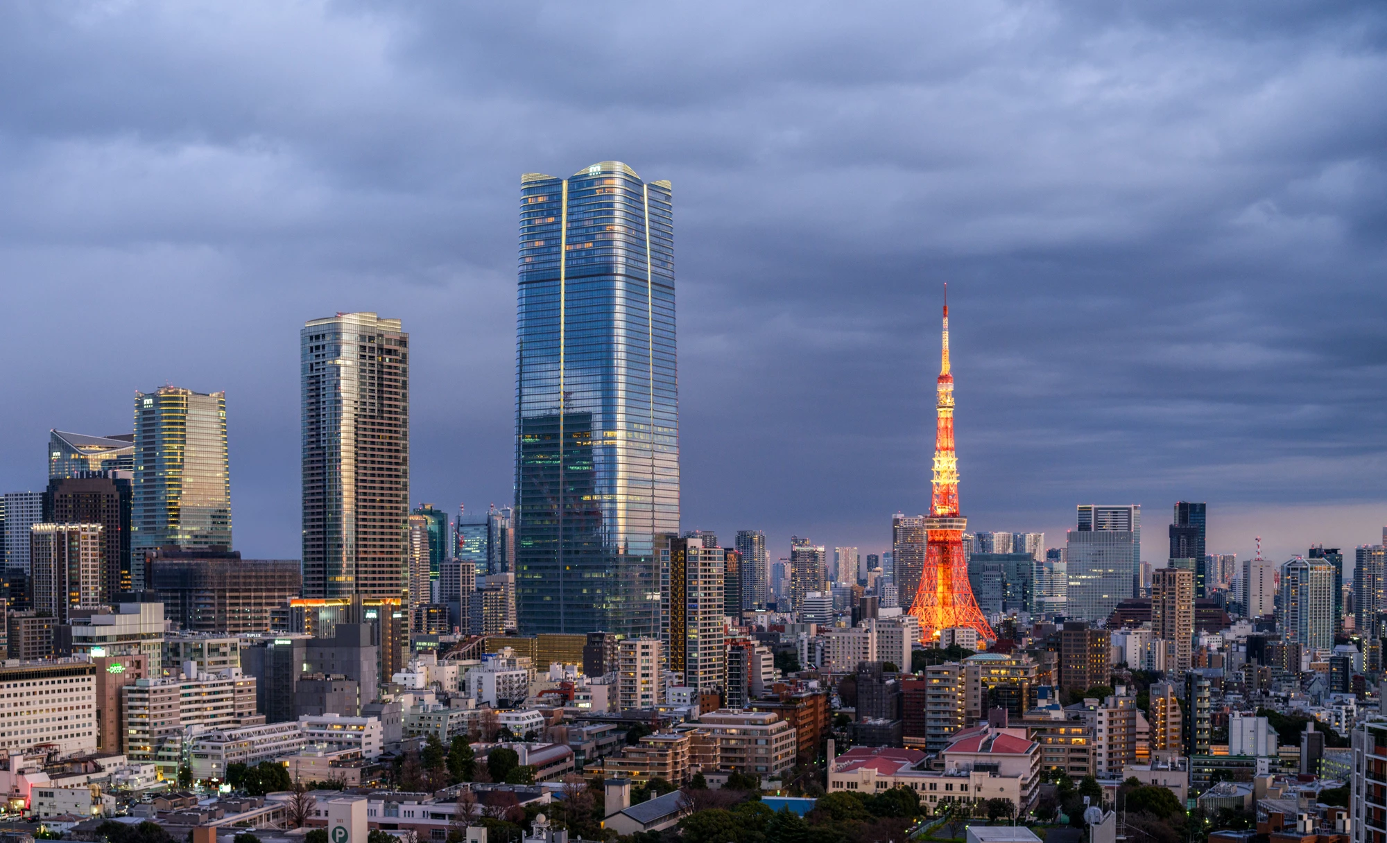 The Mori JP Tower is located near the famous Tokyo Tower, which reaches a maximum height of 332.9 m (1,092 ft)