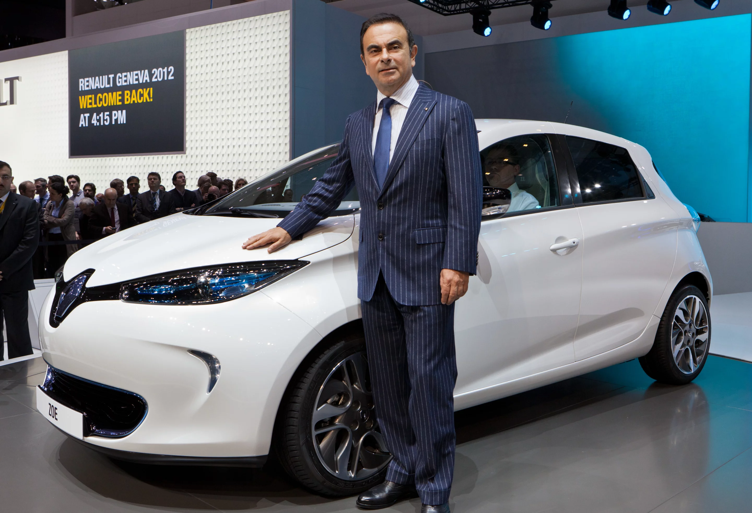 Carlos Ghosn, Chief Executive Officer of the Renault group next to the new Renault ZOE