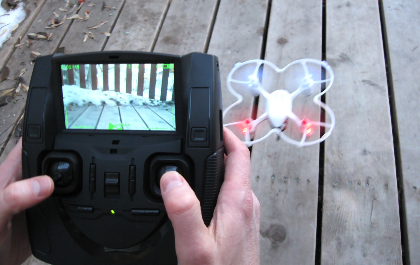 The controller receives a real-time video feed from the quadcopter