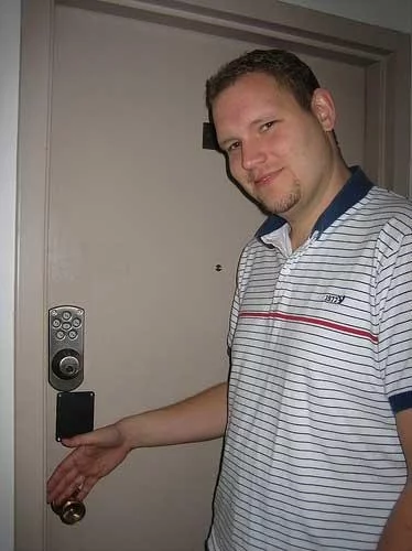 Amal unlocks the front door, sans keys