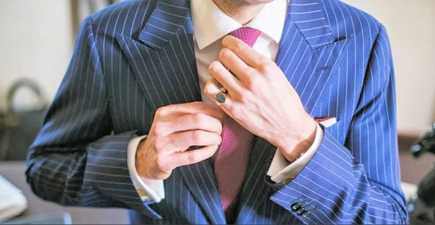 Adjusting one's tie after a dust-up? (Photo: Garrison Bespoke)