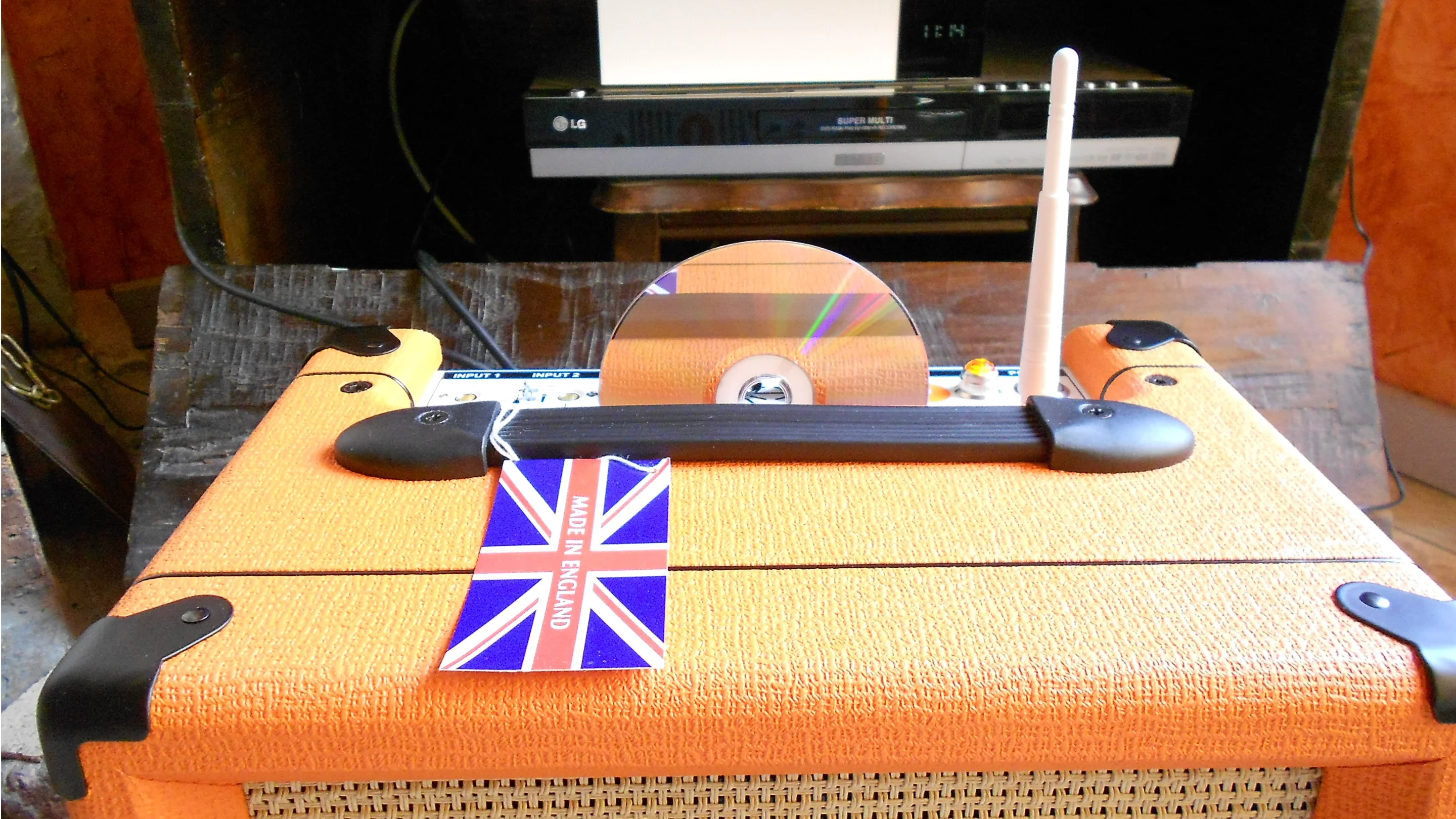 Using the OPC' slot-loading DVD re-writer to line up some video entertainment for the family