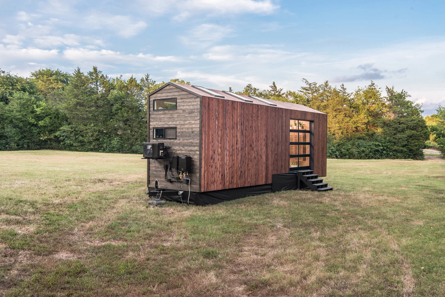 The Orchid Tiny House is heated and cooled with a HVAC (heating, ventilation and air-conditioning) unit