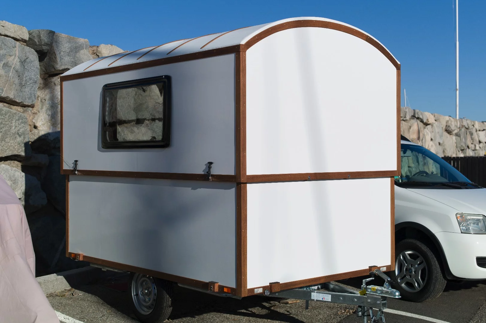 The Slidavan lifts with help from a simple, drill-powered system and offers 6 feet of headroom inside