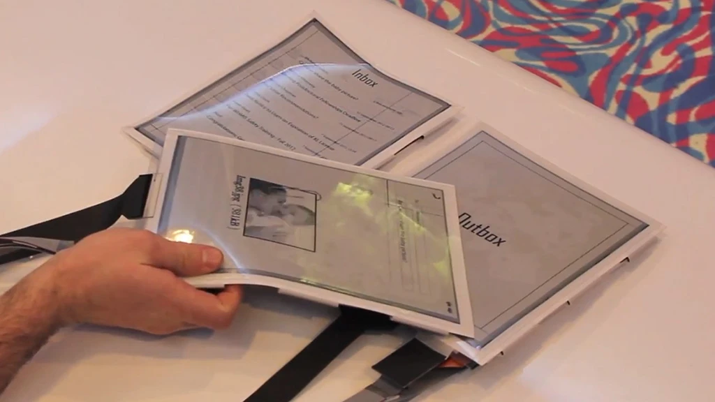 An email on one PaperTab can be sent by touching the outbox on another PaperTab