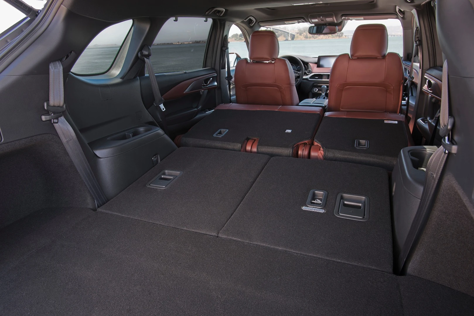Cargo space in the CX-9 stands at only 72 cu ft (2,039 liters) with the second and third rows folded