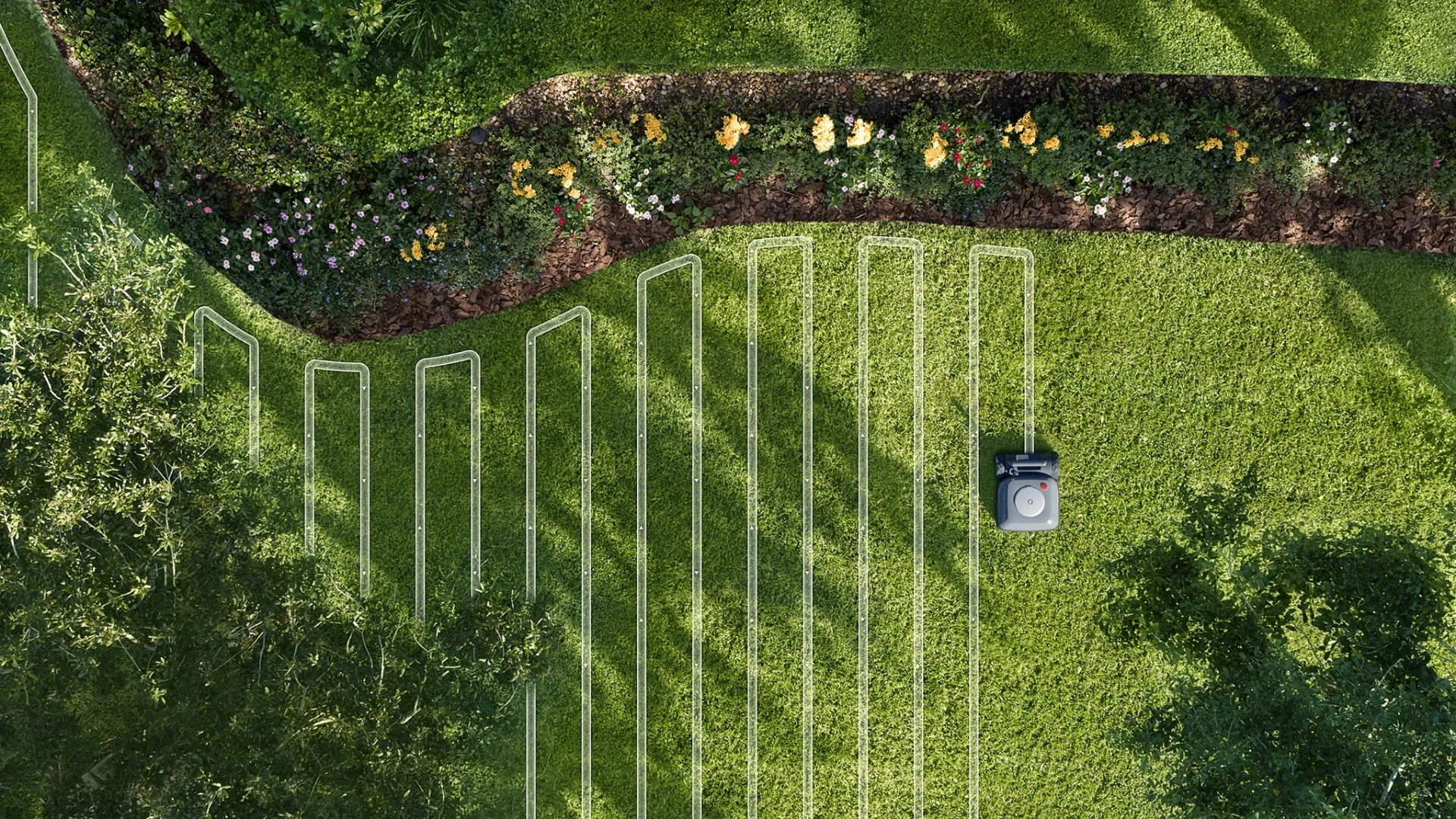 iRobot says that the Terra robot mower mows the lawn just like people do