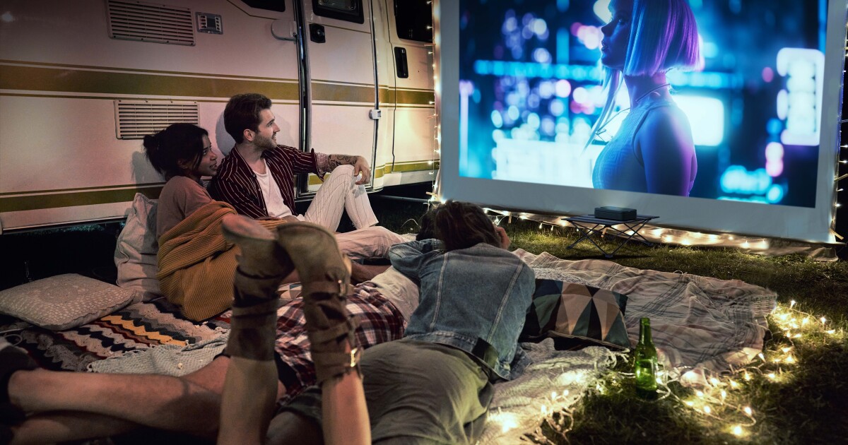 Portable triple-laser projector for home and travel