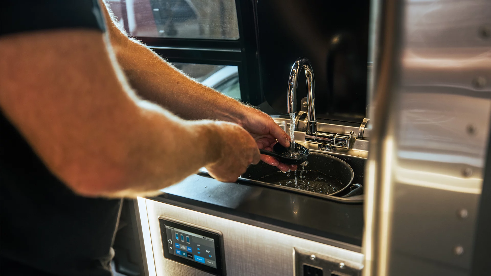 The split kitchen helps Airstream houses its two-person floor plan