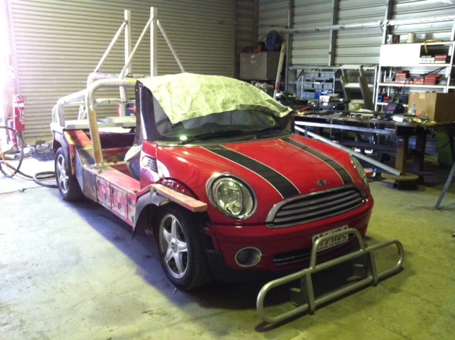 The red and black Mini reject that's transformed into an ethanol-powered mobile charging station