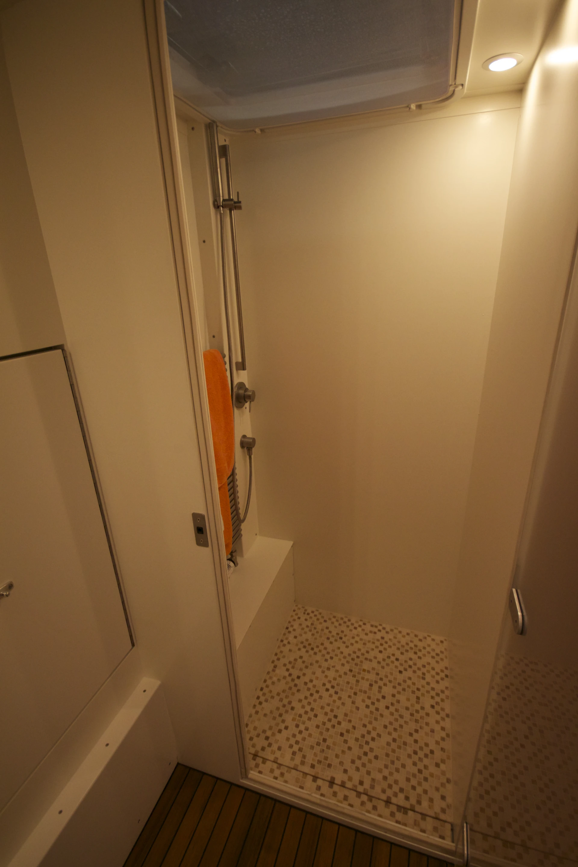 Unicat makes things more like home with a tiled shower and porcelain flush toilet