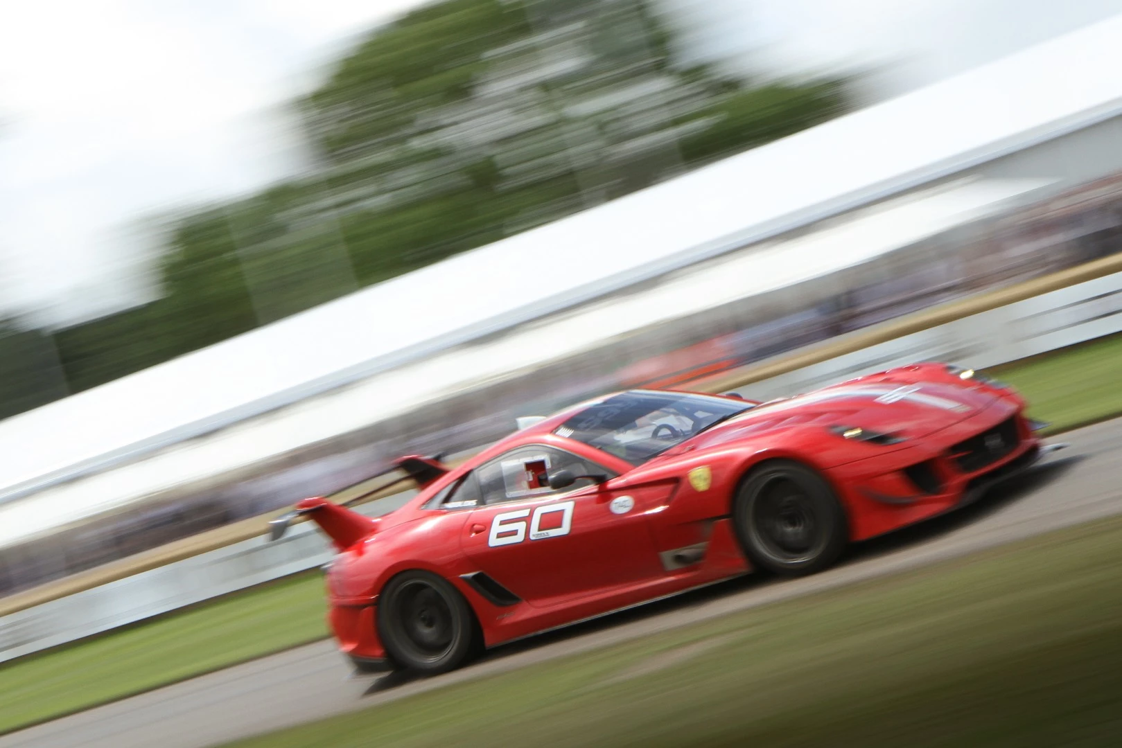 The Ferrari 599X looks properly racy with its big wing, scoops and intakes