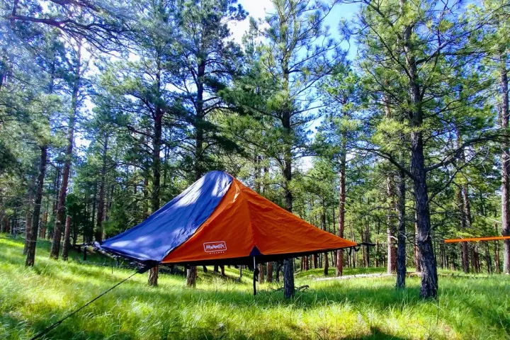 The Bivymok system can be suspended from trees to lift campers off the ground