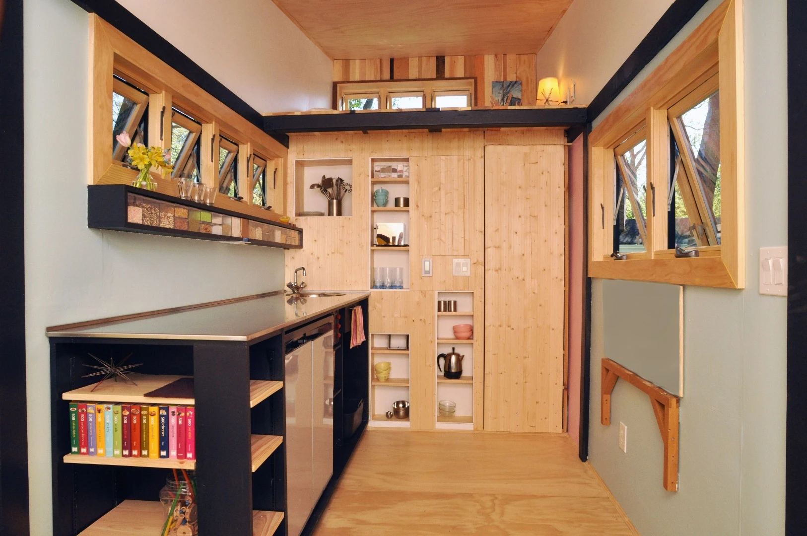 The interior includes a relatively generous living space, which measures 7 x 9 ft (2.1 x 2.7 m)