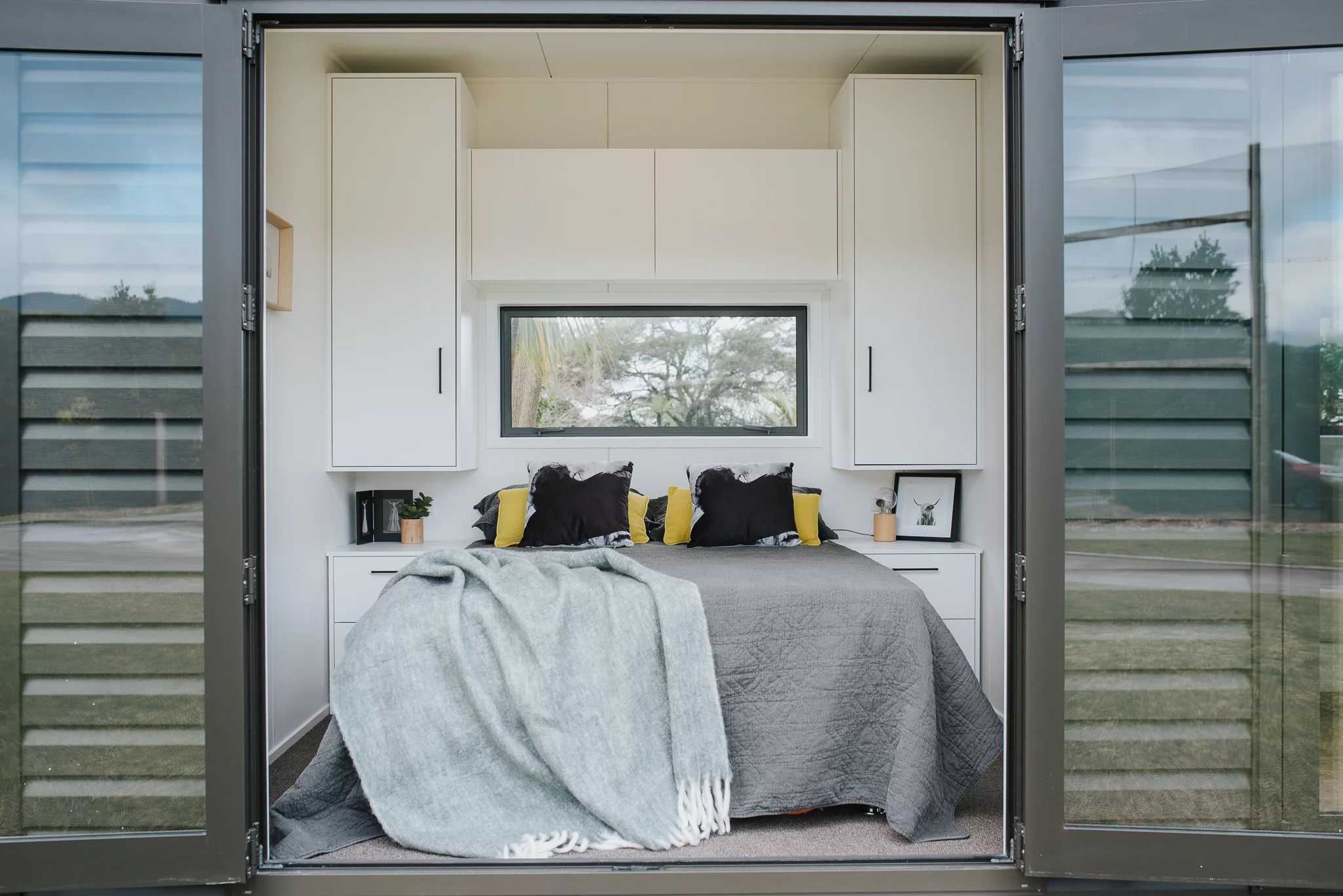 The Dark Horse's bedroom includes a double bed and some storage space