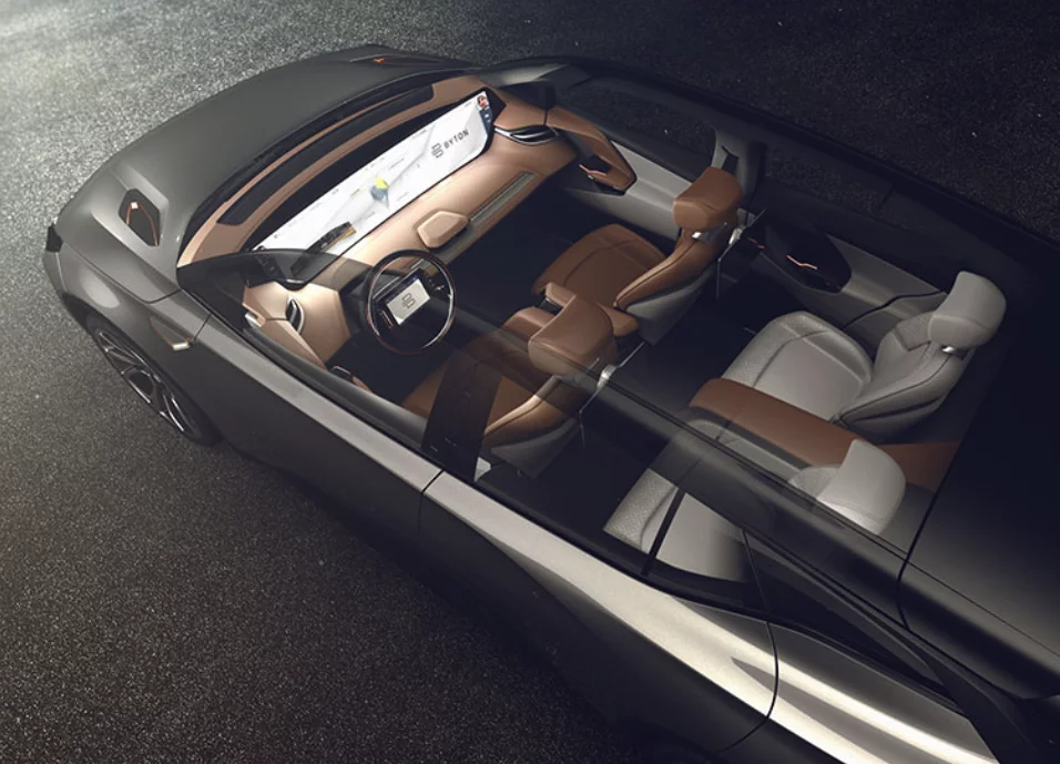The Byton Concept features a four-seat interior with flat, wood floor, leather seating and plenty of digital display space