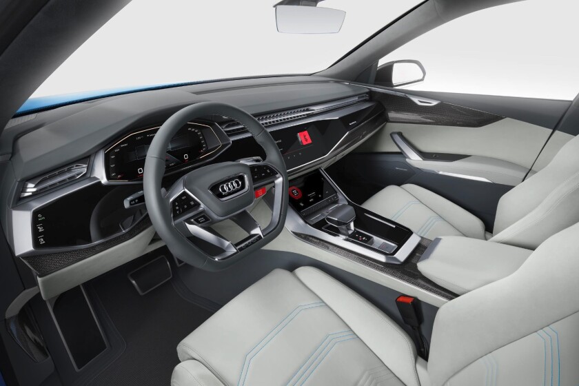 The Q8 concept’s drive system is controlled through both a built-in predictive efficiency assistant and driver-toggled controls