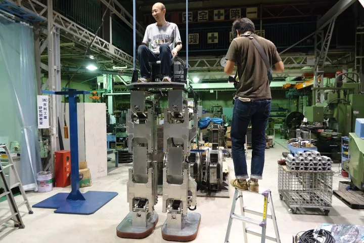 Hajime Sakamoto sits in the pilot seat of his 4 meter tall robot