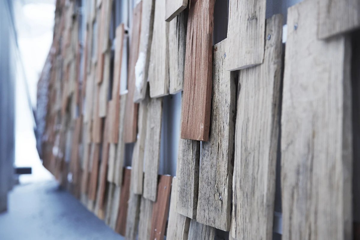 Each panel is hand cut and a decision was made to leave the wood untreated, so that the faced would age naturally over time