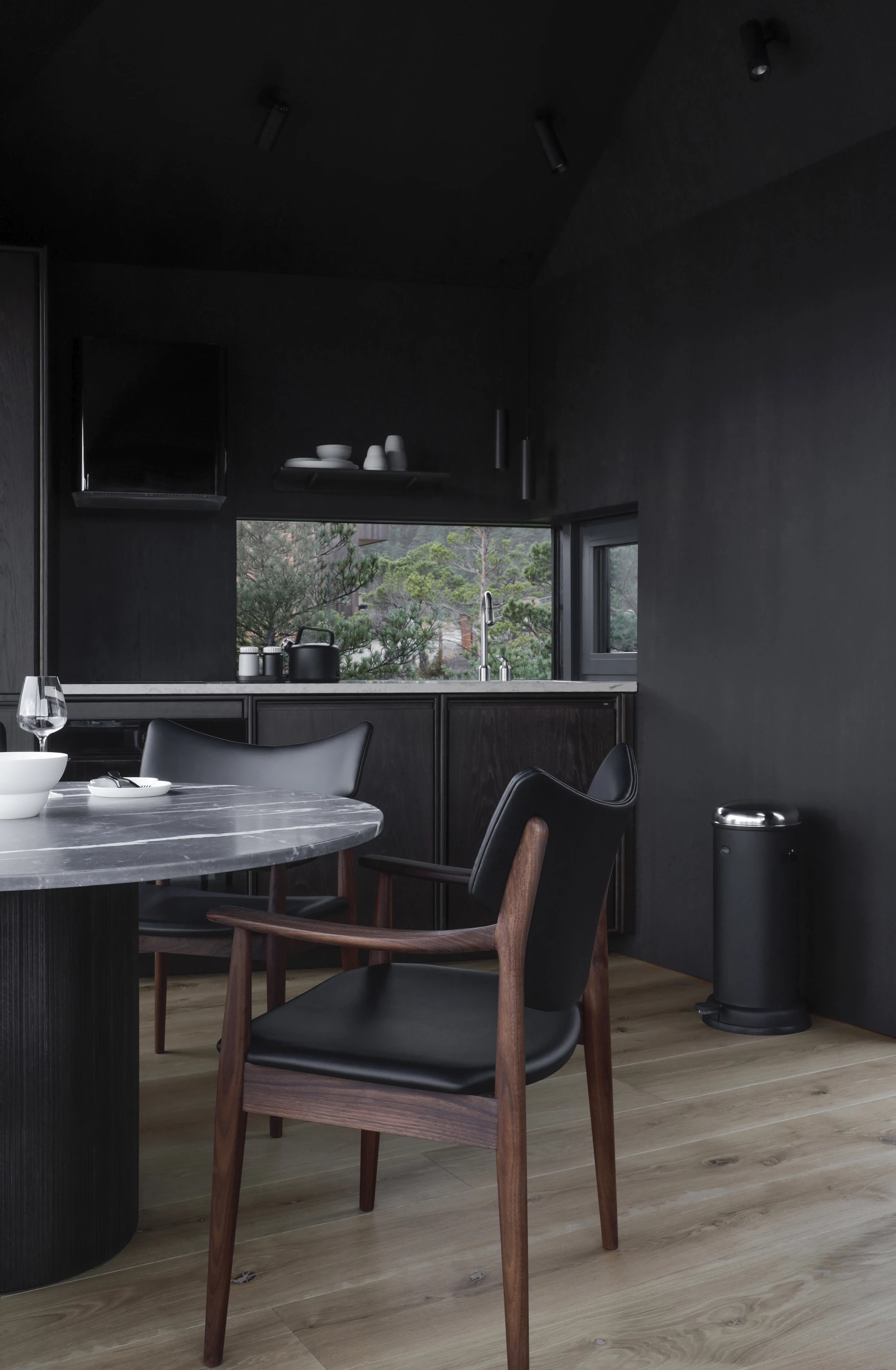 The Bolder Star Lodges interior design was created in collaboration with homeware firm Vipp and the cabins are decorated in the firm's characteristic dark hues
