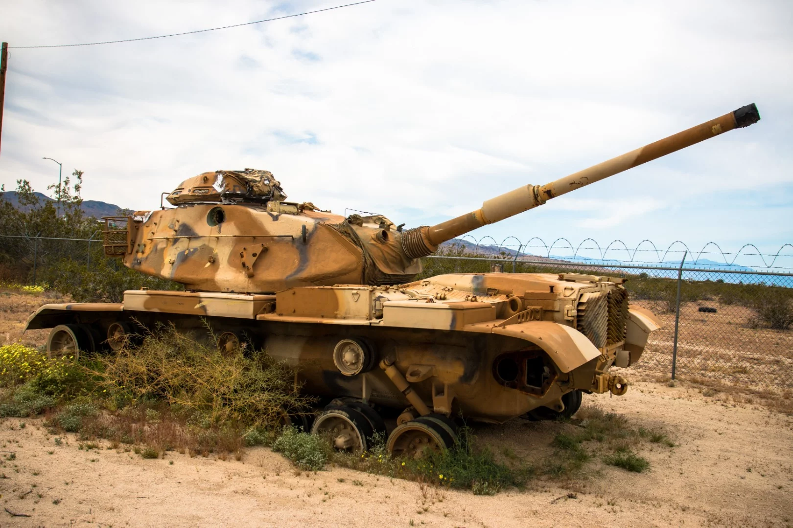 A trackless M60 Patton tank with its turret facing backwards