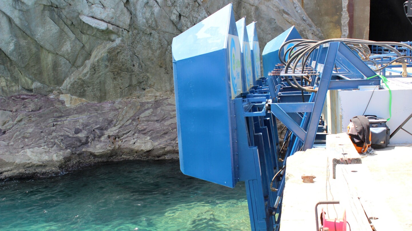 The hardware installed on the jetty in Gibraltar is well suited to its environment, with a pointed design to split through waves, and the ability to gather power even in good weather