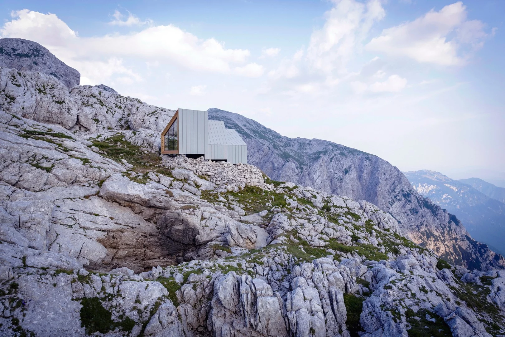 The construction of building features three distinct layers, comprising of an outer shell, structural frame and interior shell