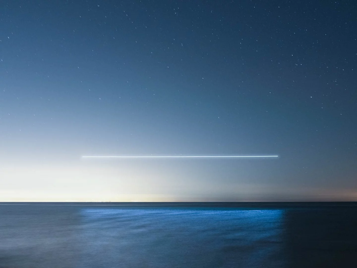 Stripping the landscape away from the images resulted in a compelling minimalism highlighting the reflections of the drone light on the water