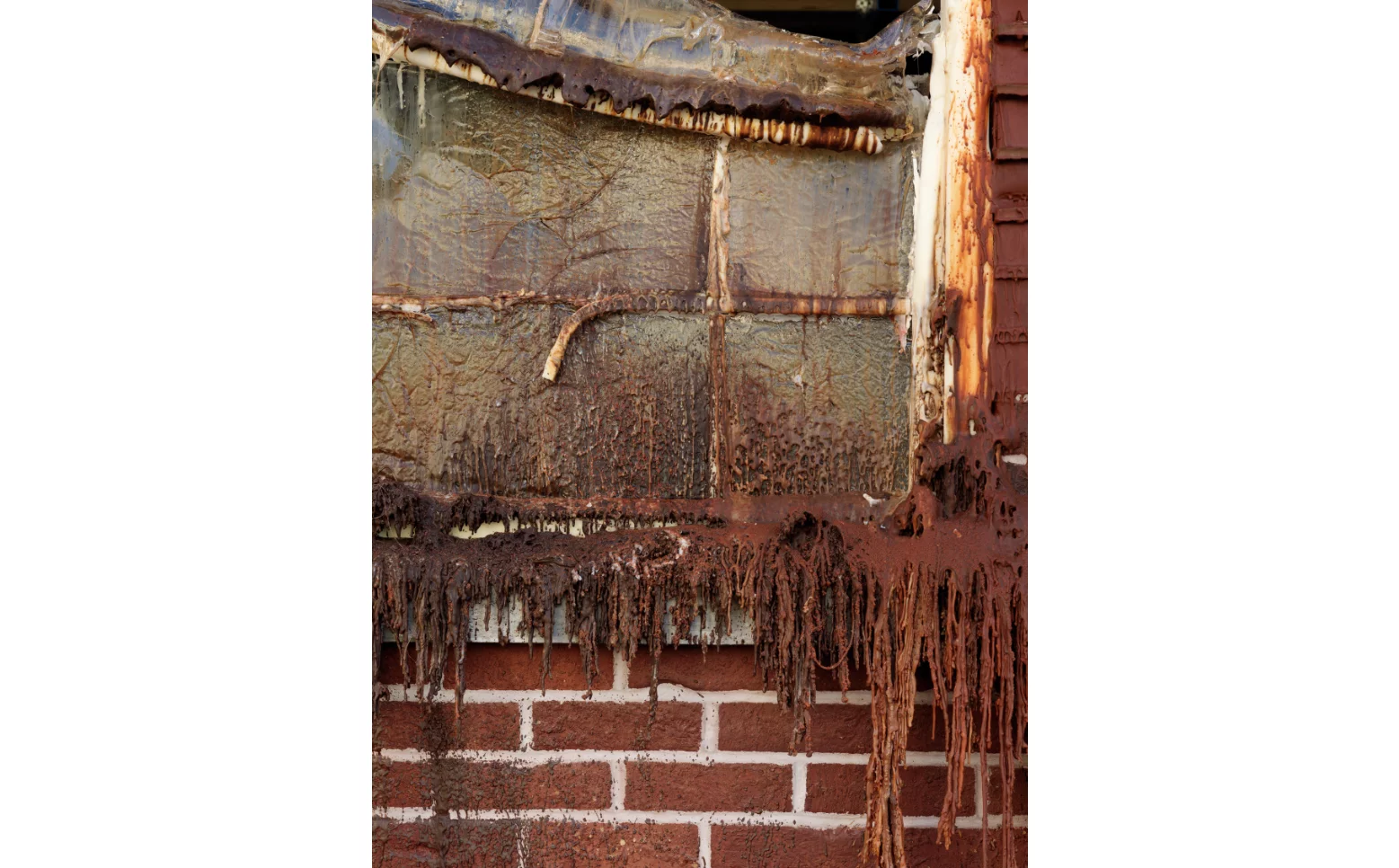 A pound of flesh for 50p displayed a slowly melting house, made out of wax bricks, disappearing over two months