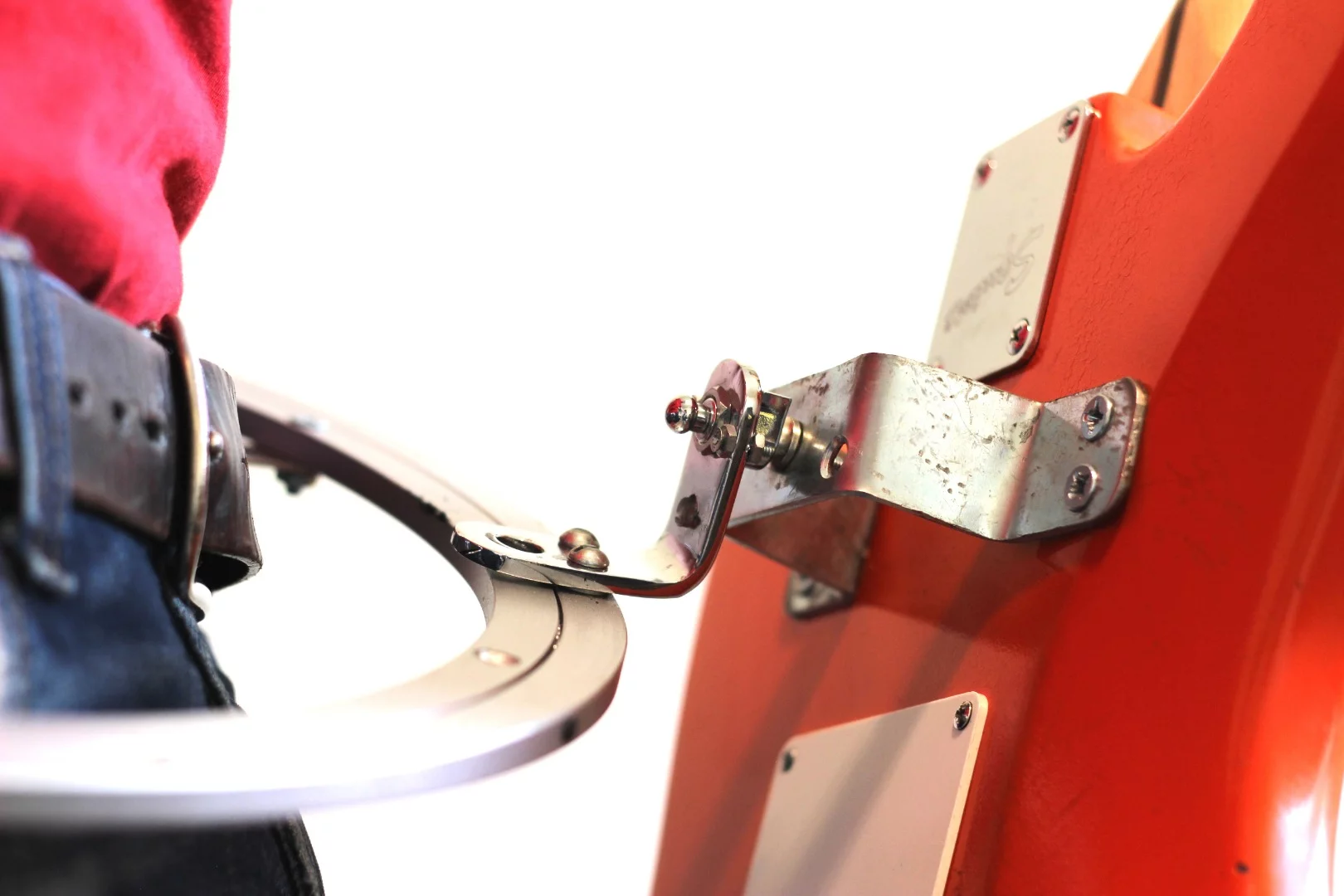 "The guitars are basically attached by a couple of strap locks that are mounted to brackets that are bolted to the guitar and outer ring of the lazy susan," said GuitaRing inventor Cyle Ziebarth