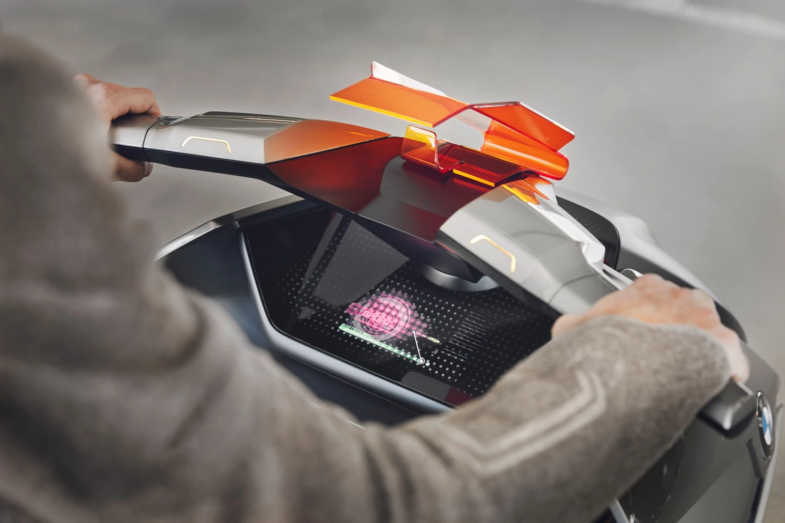 A wide touch screen below the BMW Motorrad Concept Link's handlebars displays a wealth of information