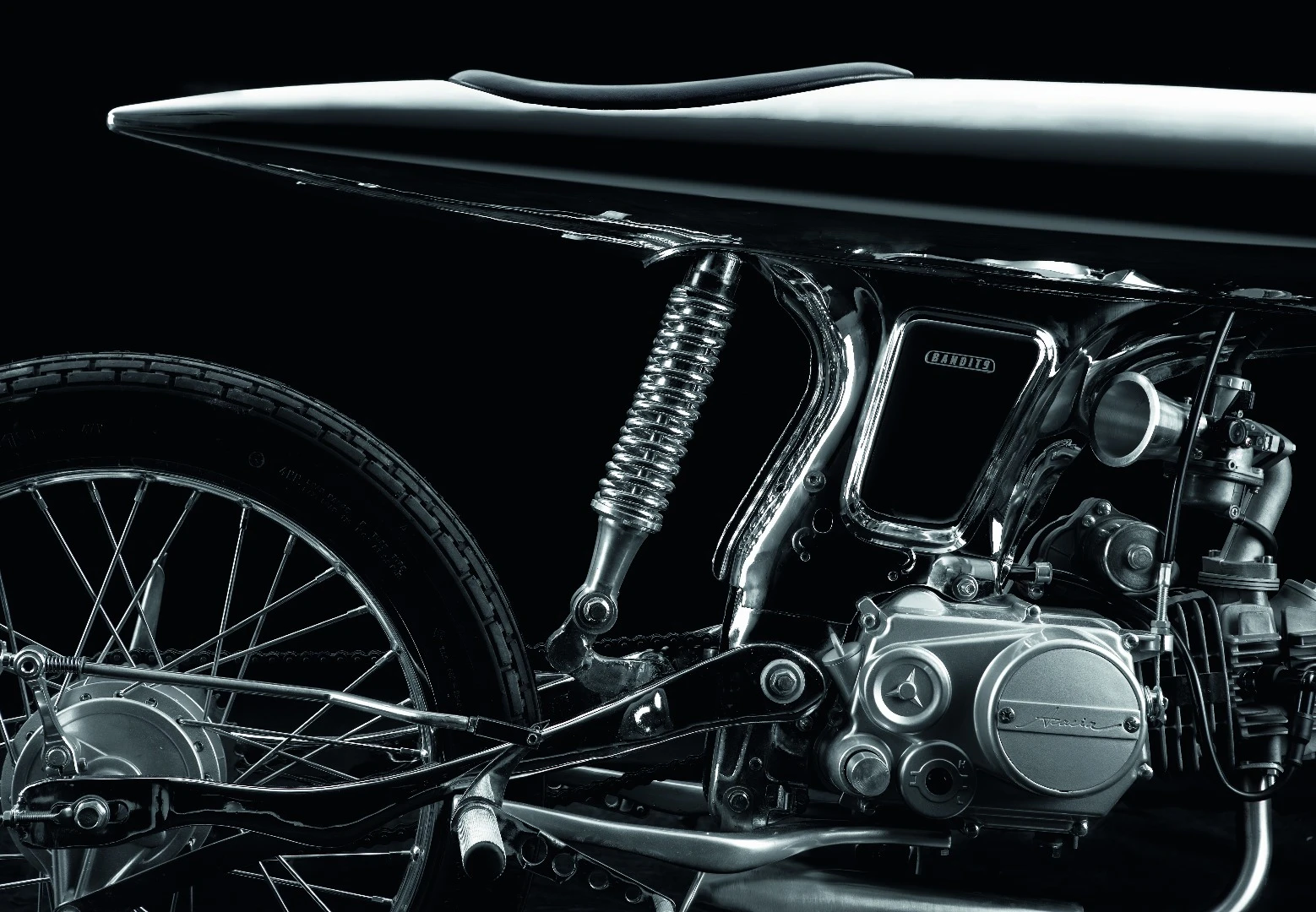 The Eve MK II custom leather seat is fully integrated into the unibody of the bike