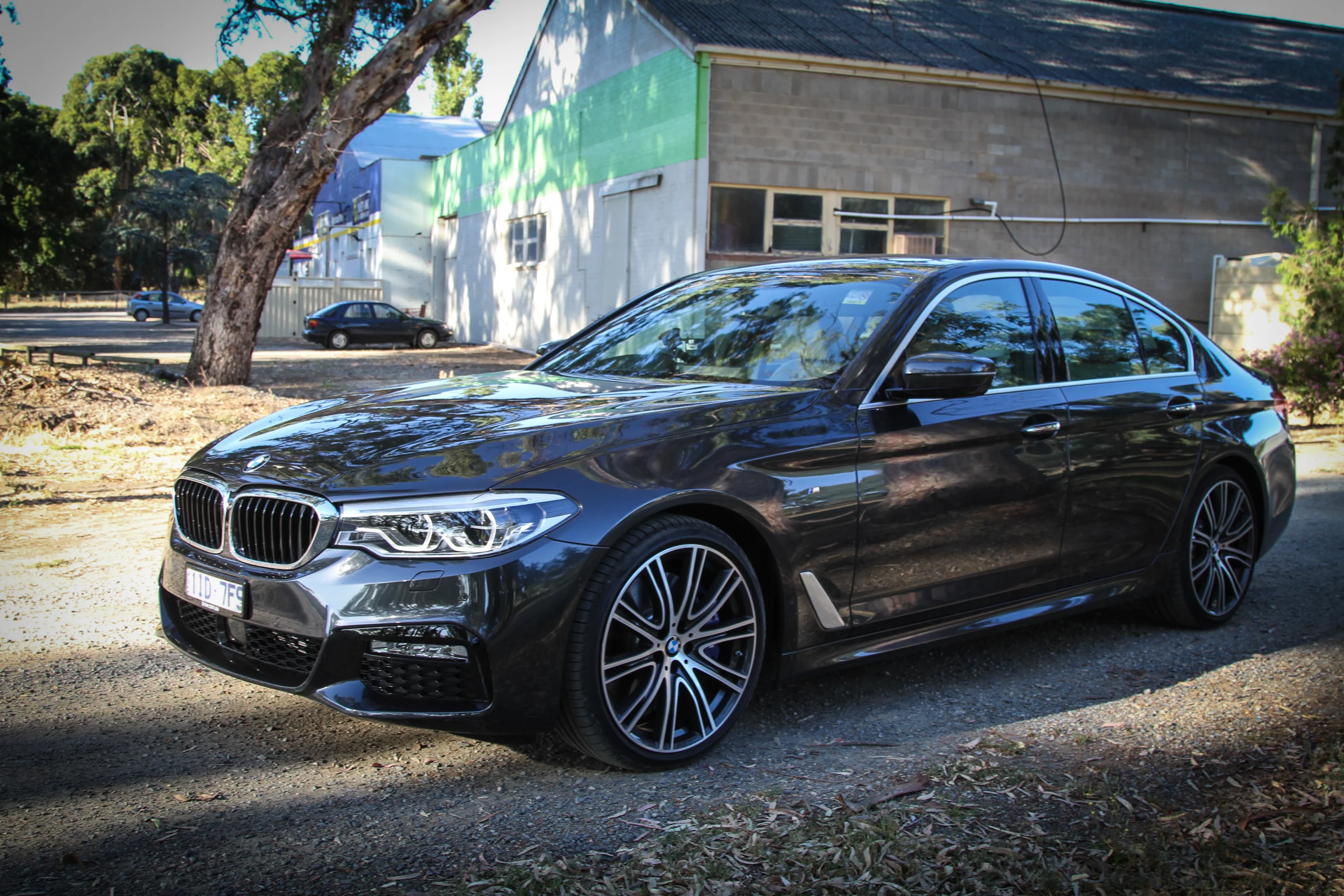 The BMW 540i sporting 20" alloy wheels and Carbon Black metallic paintwork
