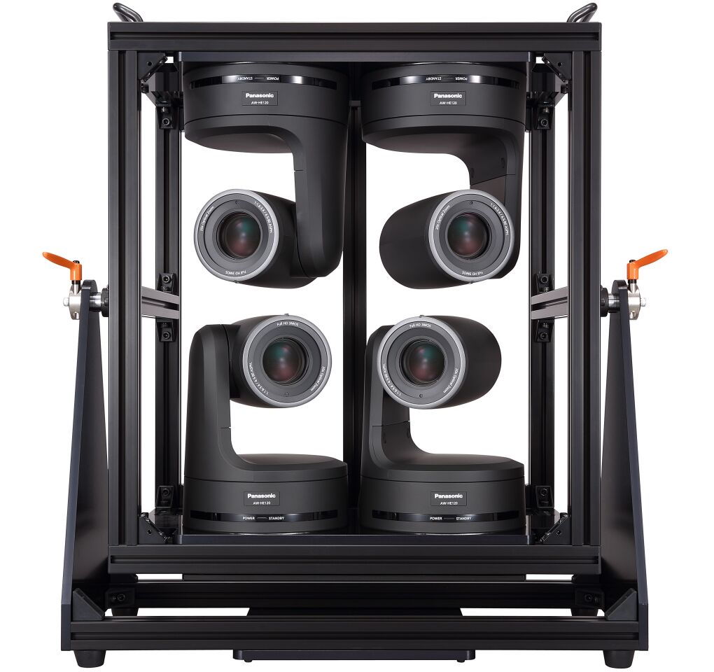 Software is used to “seamlessly” stitch the four cameras’ shots together in real time, side-by-side, to form one really wide picture