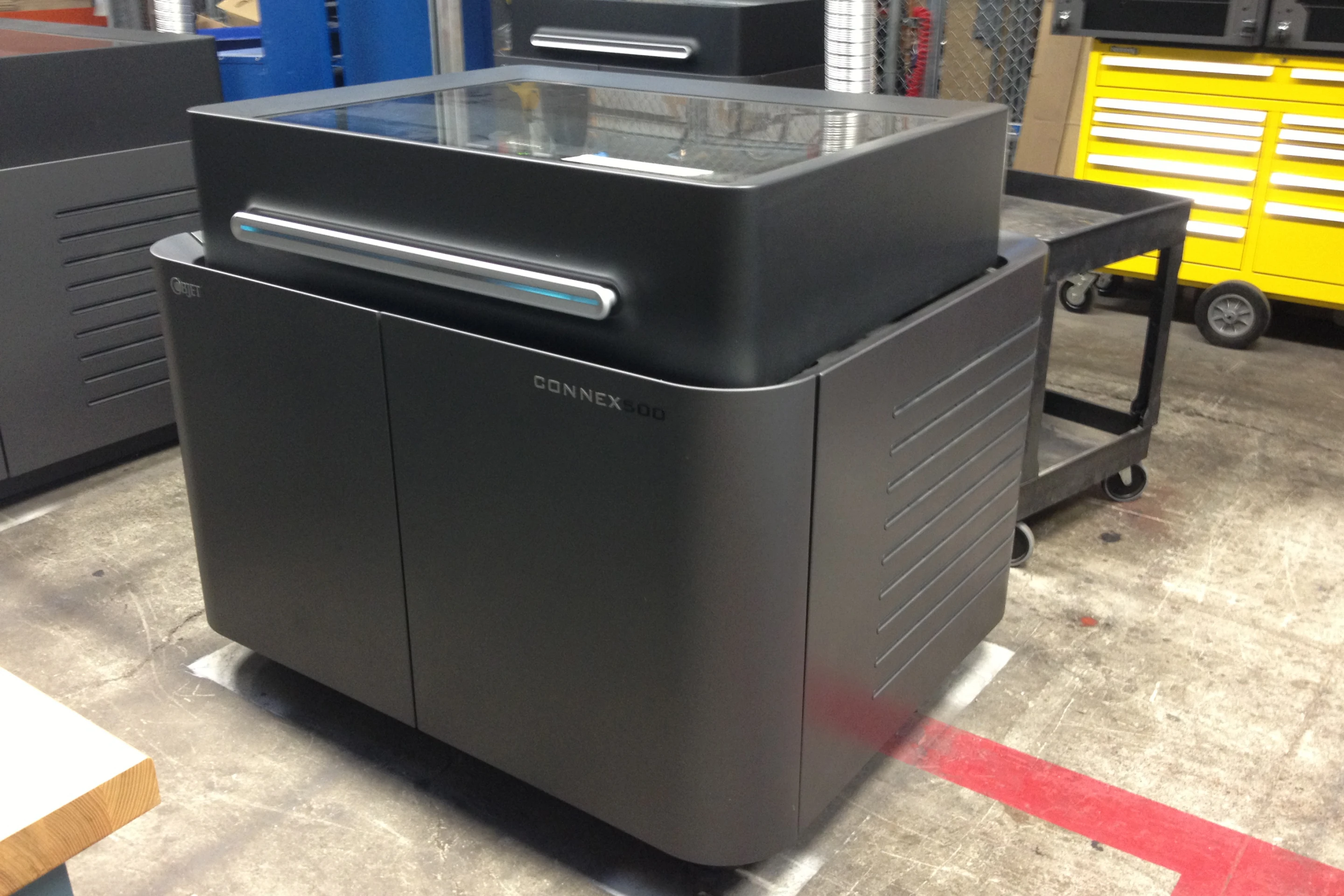 The high resolution Objet Connex500 UV-cured resin printer used to print the records