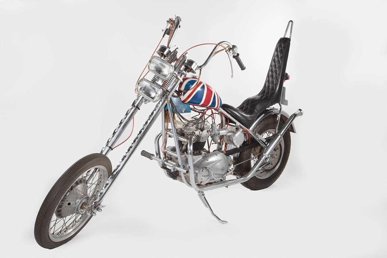 This is the custom Triumph “Sunset Tripper” chopper ridden in the epic documentary film The Song Remains the Same. Led Zeppelin commissioned Ron Hagest, owner of California-based Burbank Customs, to create Triumph-based choppers for each of the band members and this bike was built for drummer John Bonham, inspired by the “Captain America” chopper from Easy Rider.